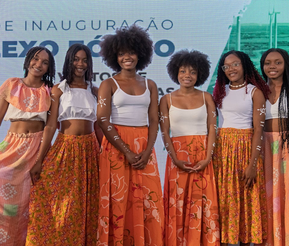 a group of women posing for a photo a group of women posing for a photo
