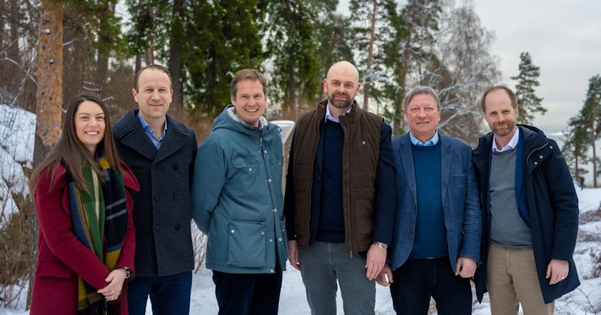 a group of people posing for a photo
